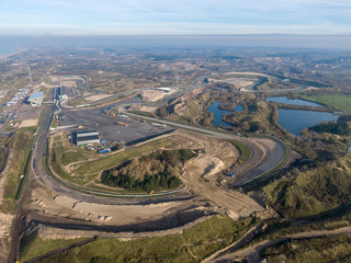 Aerial of race track in the dunes with road maintenance interventions in Zandvoort, the Netherlands 