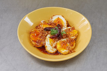 Boiled egg fried with tamarind sauce, Thai cuisine .