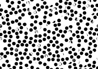 Small uneven spots and particles of debris. Abstract vector texture.  Distressed uneven background. Grunge texture overlay with fine grains isolated on white background. Vector illustration. EPS10.