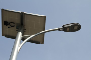 street lamp in front of blue sky
