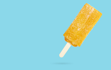 Yellow mango fruit popsicle ice cream stick isolated