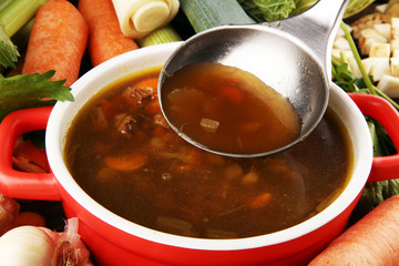 Meat stew with beef, potato, carrot, onion, spices, green peas. Slow cooked meat stew, bowl. Hot autumn or winter dish. Closeup. Comfort food.