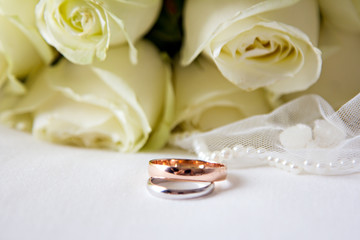 Wedding rings, veil, white roses, wedding accessories