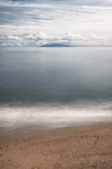 Abwaschbare Fototapete Cappuccino Insel Elba gesehen von einem Strand in Korsika