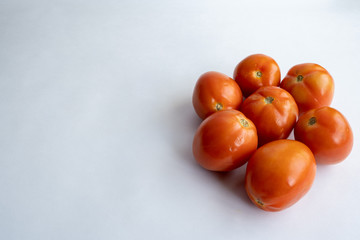 Red Tomatoes isolated on a White background with negative space