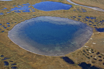 Polygonal tundra landscape in summer, Taymyr peninsula, aerial view