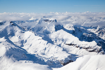 Fototapeta na wymiar amazing snow covered peaks in the Swiss alps Jungfrau region from Schilthorn