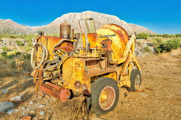 Mobile automatic self-loading concrete mixer. Little yellow truck automixer for mines and pits for...