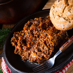Polish bigos with sausage and dried plum