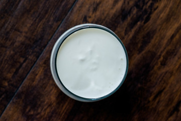 Organic Probiotic Milk Kefir Yogurt in Glass Cup Ready to Drink.