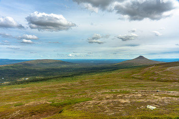 Landscape view across the Swedish highlands in summer sunlight