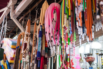 Metal bowl for Smoking and traditional Asian relaxation close up. Turkish glass hookahs on the Istanbul market (bazaar) hookah pipes of different bright colors and designs.