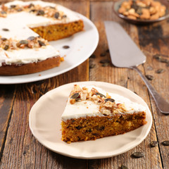 carrot cake with cream and nuts