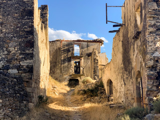 Ruined houses in abandoned village of Esco, Spain
