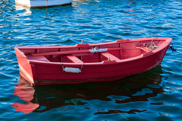 Red boat in the sea