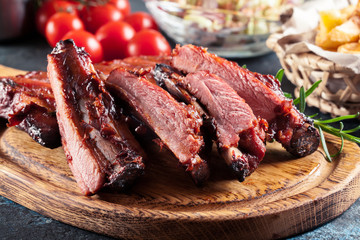 Spicy barbecued pork ribs served with BBQ