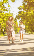 Mother and daughter in nature.