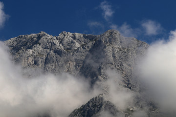 Fototapeta na wymiar Mountain shrouded in clouds