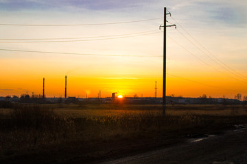 Fototapeta na wymiar industrial landscape factory at sunset