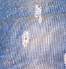 Jeans design.Grunge jeans pattern. Casual jeans background. Grunge denim texture. Surface for text.
