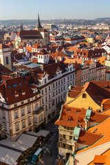 Fototapeta na wymiar city views Prague autumn. Old Town Square. Tiled roofs. View from above.