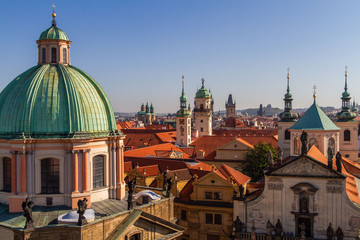 city views Prague autumn. Church. Tiled roofs. View from above.