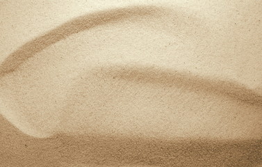 Golden Sand on the beach as background. Sand Texture. Golden sand. Background from fine sand.