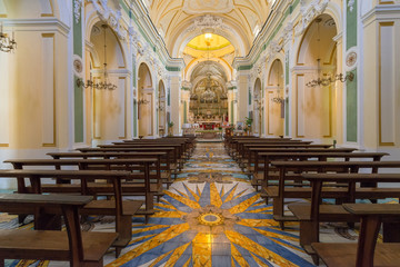 Obraz premium NAPLES, ITALY - 10.05.2018: Interiors and details of the Duomo, cathedral of Praiano church, Amalfi Coast. Built for saint Januarius, Campania, Italy in summer.