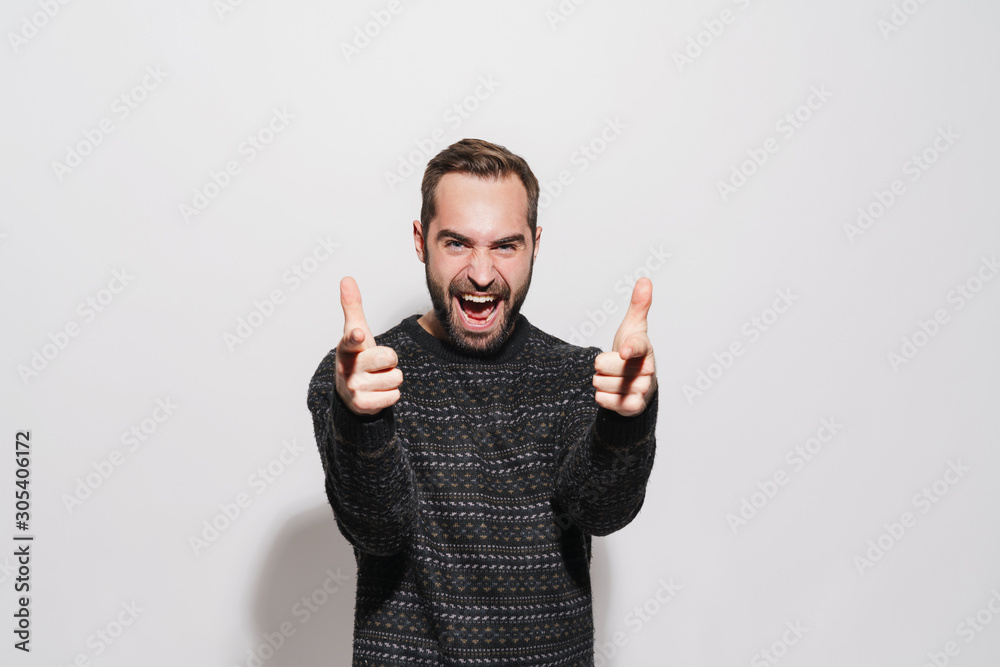 Poster Image of man in winter sweater screaming and pointing finger at camera