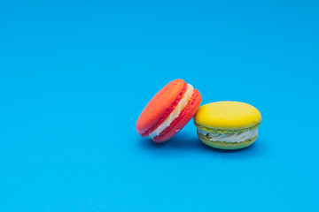 Flying macaroons with colorful backround