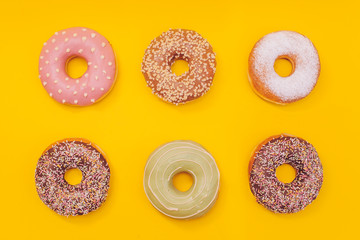 Flying donuts with colorful background