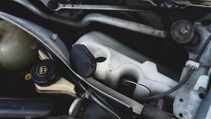 Fototapeta premium washer reservoir on a car