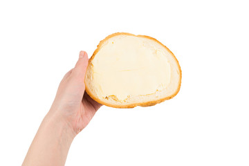 Bread and butter in woman hand isolated on white background.