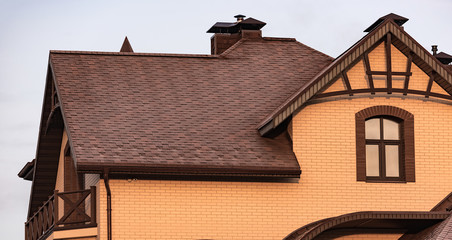house with a gable roof window