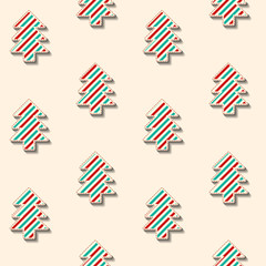 Seamless background pattern. Christmas pattern with christmas trees in cut out style. Vector image