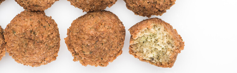 top view of delicious fresh cooked falafel balls on white background, panoramic shot