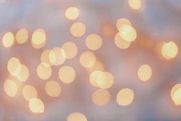 Yellow glitter lights background. defocused bokeh christmas lights
