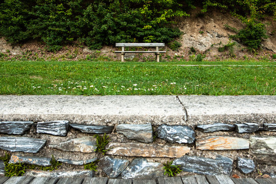 Blank old wooden bench in the park