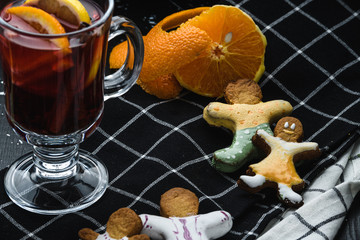 Cookies with fruit tea on a wooden background