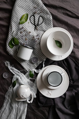 flat in the Scandinavian style. Beautiful dishes, flowers, candles, floristic composition