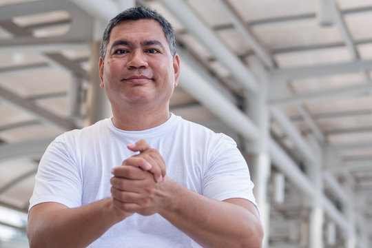 Confident Old Senior Man Clapping His Hand; Strong Happy Healthy Asian Senior Man In City Environment; Senior Old Man Model For Senior Citizen, Pensioner, Retired Man Concept Usage