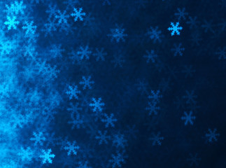 Blue snowflakes bokeh abstract background.