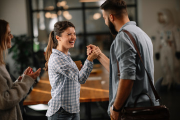 Successful teamwork. Business people in office.