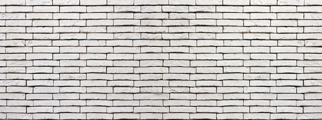 Arrière plan ou bannière mur de briques blanches