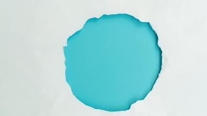 Top view blue sky torn paper on  white and grey background. Bank copy space