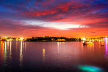 Colorful sunset sky and cloud in twilight time background. Landscape of Sliema, Malta.