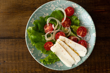 lettuce, tomatoes, onions, cheese and olive oil. Vegetable plateau. 