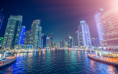 Fototapeta na wymiar Dubai Marina night skyline. Buildings and river, United Arab Emirates