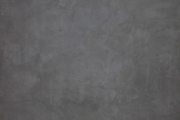 Dark grey cement wall with rustic natural texture for abstract background and design purpose
