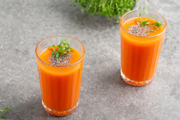 Fresh carrot smoothie with Chia seeds and herbs. Healthy organic carrots smoothie. Detox concept 